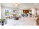 Spacious living room with open floor plan and kitchen views at 174 Green Oak Park, Rotonda West, FL 33947