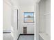 Simple bathroom with tiled floor and a window at 5021 24Th S Ave, Gulfport, FL 33707