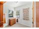 Cozy bedroom with a window, dresser, and shell wall hanging at 5021 24Th S Ave, Gulfport, FL 33707