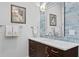 Bathroom with dark wood vanity and blue tile at 5104 Homer W Ave, Tampa, FL 33629