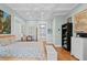 Bright bedroom with a floral bedspread and built-in shelving at 5104 Homer W Ave, Tampa, FL 33629