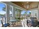Covered patio with seating area and waterfront views at 5104 Homer W Ave, Tampa, FL 33629