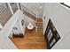 Elegant entryway with a grand staircase and hardwood floors at 5104 Homer W Ave, Tampa, FL 33629