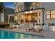 Two-story house with pool and lounge chairs at 5104 Homer W Ave, Tampa, FL 33629