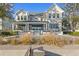 Gray house exterior with a large pool and patio at 5104 Homer W Ave, Tampa, FL 33629