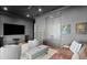 Media room with leather sofas and a large TV at 5104 Homer W Ave, Tampa, FL 33629