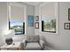 Cozy sitting area with a comfortable chair and views of the water at 5104 Homer W Ave, Tampa, FL 33629