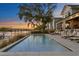 Relaxing pool area with lounge chairs and water view at 5104 Homer W Ave, Tampa, FL 33629