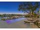 Inviting swimming pool with lounge chairs and waterfront view at 5104 Homer W Ave, Tampa, FL 33629