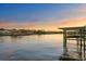 Scenic waterfront view at sunset with boats and houses at 5104 Homer W Ave, Tampa, FL 33629