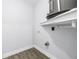 Laundry area with stacked washer dryer hookups and a built-in counter top at 2489 Oakleaf Ln # 21C, Clearwater, FL 33763