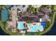 Community pool and tennis courts are shown in this overhead view at 5124 Highland Pointe Ct, Wimauma, FL 33598