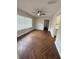 Bright living area with herringbone wood flooring at 1006 N Bask Dr, Tampa, FL 33603