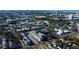 Aerial view of apartment complex, ample parking and landscaping at 1221 Drew St # E11, Clearwater, FL 33755