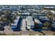 Aerial view showcasing apartment complex and nearby businesses at 1221 Drew St # E11, Clearwater, FL 33755