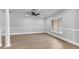 Spacious living room with hardwood floors and wainscoting at 4290 Yucatan Cir, Port Charlotte, FL 33948