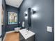 Contemporary bathroom featuring a wall-mounted toilet and sleek sink at 275 44Th Ave, St Pete Beach, FL 33706