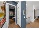 Modern powder room with stylish vanity and dark blue walls at 275 44Th Ave, St Pete Beach, FL 33706