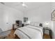 Cozy bedroom with a queen-size bed and built-in workspace at 275 44Th Ave, St Pete Beach, FL 33706