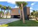 Contemporary home exterior with wood and black accents at 275 44Th Ave, St Pete Beach, FL 33706