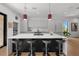 Modern kitchen with white cabinets, large island, and a sleek design at 275 44Th Ave, St Pete Beach, FL 33706