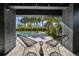 Relaxing pool area with lounge chairs and view from covered patio at 275 44Th Ave, St Pete Beach, FL 33706