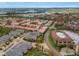 Aerial view showing home location in a community near water and highways at 290 Valencia Cir, St Petersburg, FL 33716