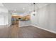 Bright dining area with hardwood floors and modern lighting at 290 Valencia Cir, St Petersburg, FL 33716