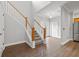 Elegant entryway with hardwood floors and a staircase at 290 Valencia Cir, St Petersburg, FL 33716