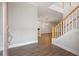 Bright and spacious entryway with hardwood floors and staircase at 290 Valencia Cir, St Petersburg, FL 33716