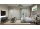 Main bedroom with sitting area, large windows, and neutral tones at 3801 71St N St, St Petersburg, FL 33709