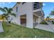 Modern garage with wood-like paneling and concrete flooring at 460 87Th Avenue North, St Petersburg, FL 33702