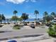 View from balcony showing beach, parking and ocean at 5605 Shore S Blvd # B, Gulfport, FL 33707