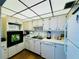 Efficient kitchen with ample cabinet space and appliances at 4910 Bay Ne St # 309, St Petersburg, FL 33703