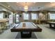 Billiards room featuring a well-maintained pool table and comfortable seating at 16233 Amethyst Key Dr, Wimauma, FL 33598