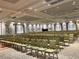 Large event space featuring rows of seating and elegant chandeliers at 16233 Amethyst Key Dr, Wimauma, FL 33598