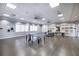 Game room boasts ping pong tables and shelving at 16233 Amethyst Key Dr, Wimauma, FL 33598