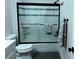 Modern bathroom with a tub shower and updated fixtures at 2841 La Concha Dr, Clearwater, FL 33762