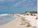 Relaxing beach scene with people enjoying the sun at 102 87Th Ave, Treasure Island, FL 33706