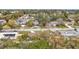 Aerial view of a residential neighborhood showcasing a variety of homes and landscaping at 1557 Jeffords St, Clearwater, FL 33756