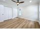 Bright bedroom with ample closet space and wood floors at 1557 Jeffords St, Clearwater, FL 33756