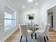 Bright dining area with a glass table and modern decor at 1557 Jeffords St, Clearwater, FL 33756