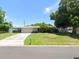 Ranch-style home with attached garage and spacious yard at 1557 Jeffords St, Clearwater, FL 33756