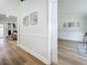 Bright hallway with light walls and wood-look floors at 1557 Jeffords St, Clearwater, FL 33756