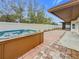 Private hot tub and patio perfect for outdoor relaxation at 1557 Jeffords St, Clearwater, FL 33756