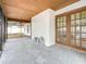 Covered screened porch with concrete floor and french doors at 1557 Jeffords St, Clearwater, FL 33756