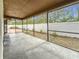 Screened porch with view of the backyard and hot tub at 1557 Jeffords St, Clearwater, FL 33756