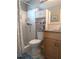 Bathroom with cabinet for storage and shower at 4415 96Th N Ave, Pinellas Park, FL 33782