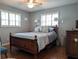 Bedroom with hardwood floors, natural light, and a ceiling fan at 4415 96Th N Ave, Pinellas Park, FL 33782