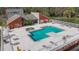 Community pool area with surrounding deck and lounge chairs at 9100 Dr Martin Luther King Jr N St # 516, St Petersburg, FL 33702